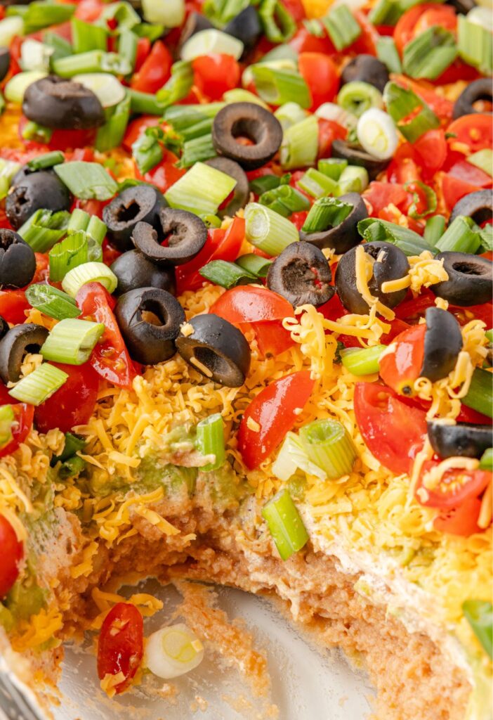 A pan of layered taco dip
