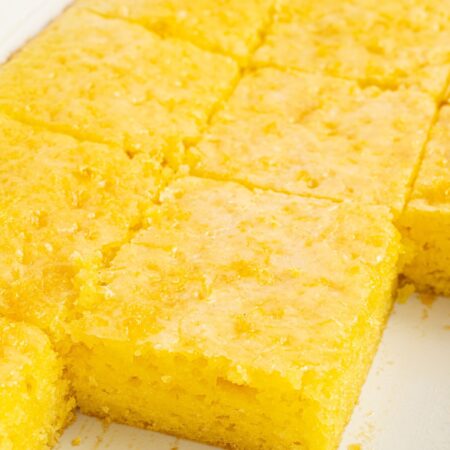 Lemon jello cake inside the white cake pan