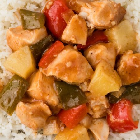 A serving of the Hawaiian chicken with rice on a white plate