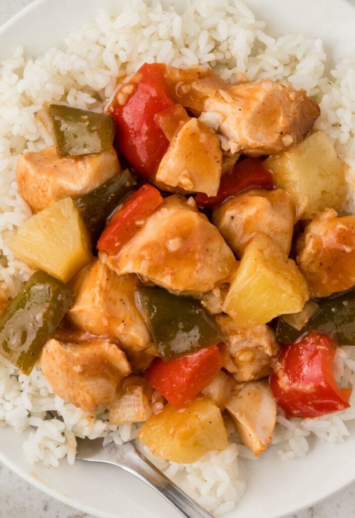 A serving of the Hawaiian chicken with rice on a white plate