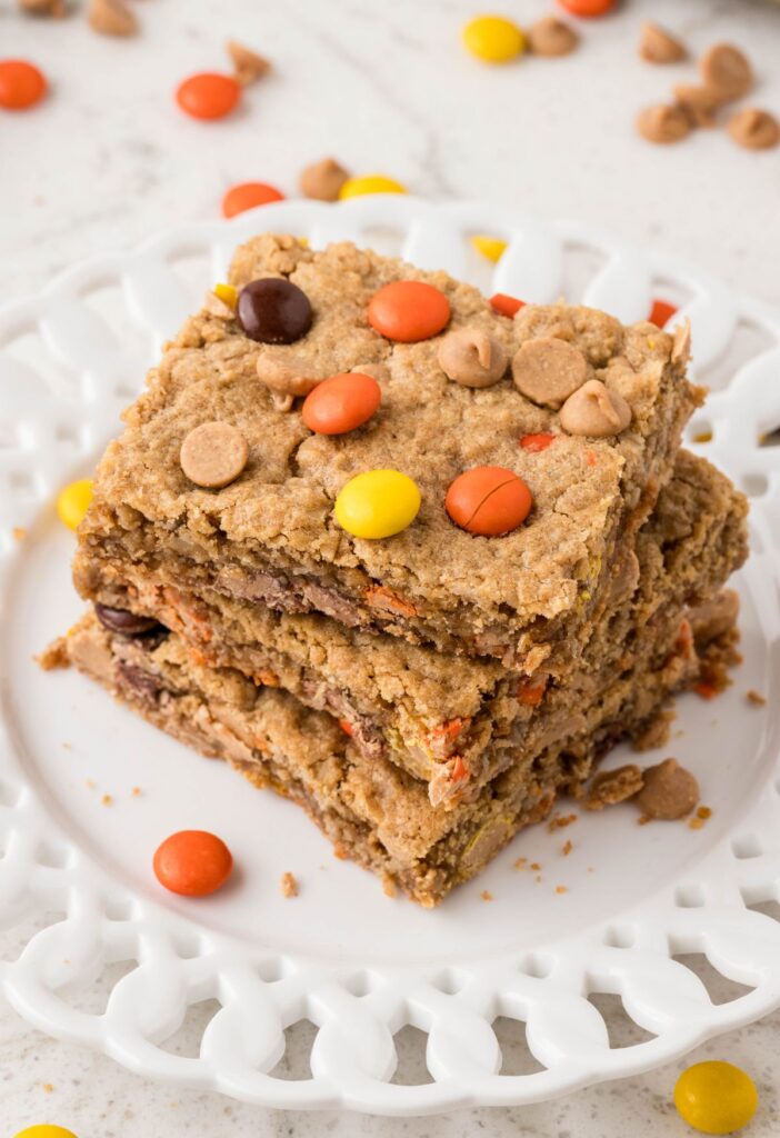 Stack of the cookie bars with Reese's pieces. 