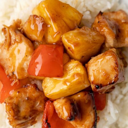 Top shot of the pineapple chicken on top of white rice