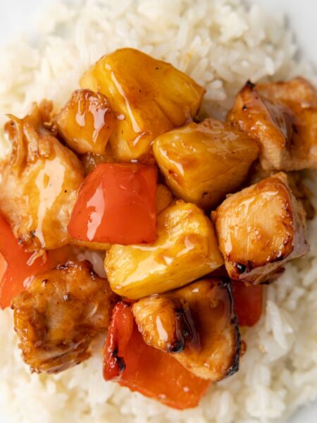 Top shot of the pineapple chicken on top of white rice