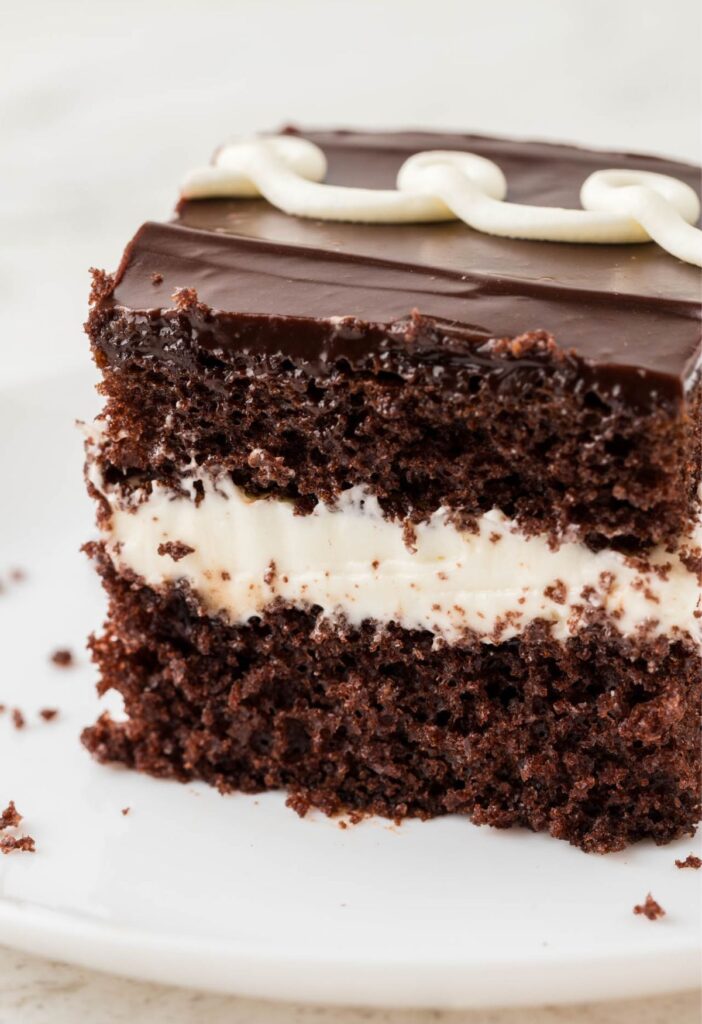 A slice of hostess cake on a white plate