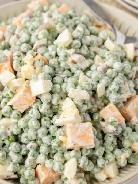 A pea salad inside a bowl