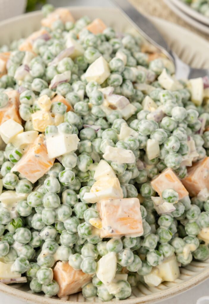 A pea salad inside a bowl