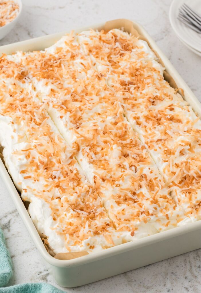 Coconut Tres Leches Cake inside a cake pan