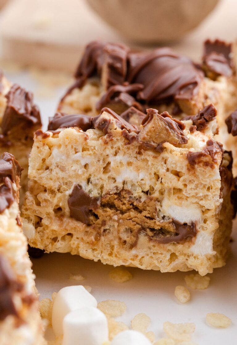 Side view of the Reeses in the middle of the crispy treat bars.