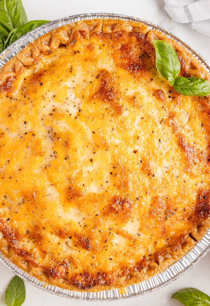 Overhead pic of the tomato pie that has been baked. 