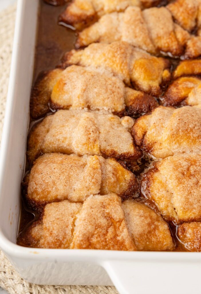 Side view of the pan of baked apple dumplings