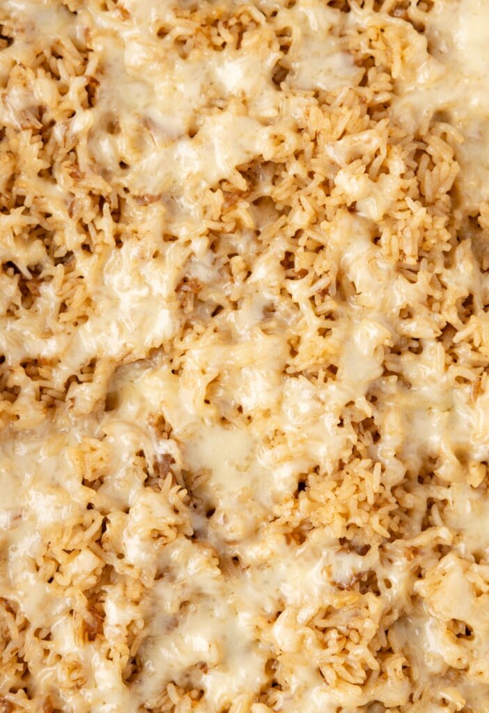 Close up of the French onion soup with melted gruyere cheese on top