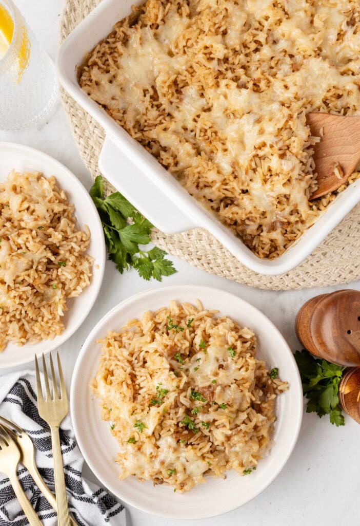 Overhead pic of the baking dish with rice in it and a serving plate with rice on it. 