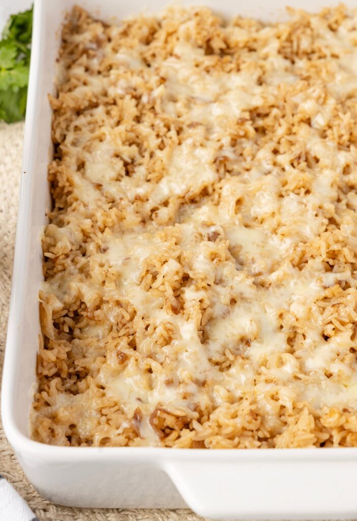 A pan of the baked French onion rice inside of it. 