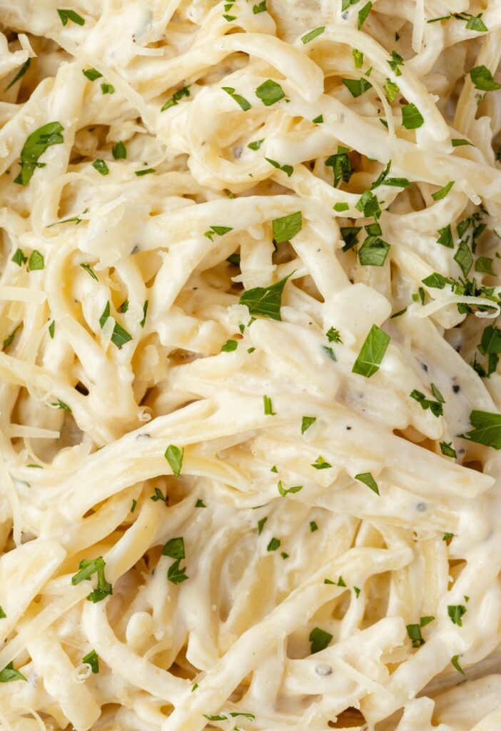 Close up of the creamy pasta with parsley on top