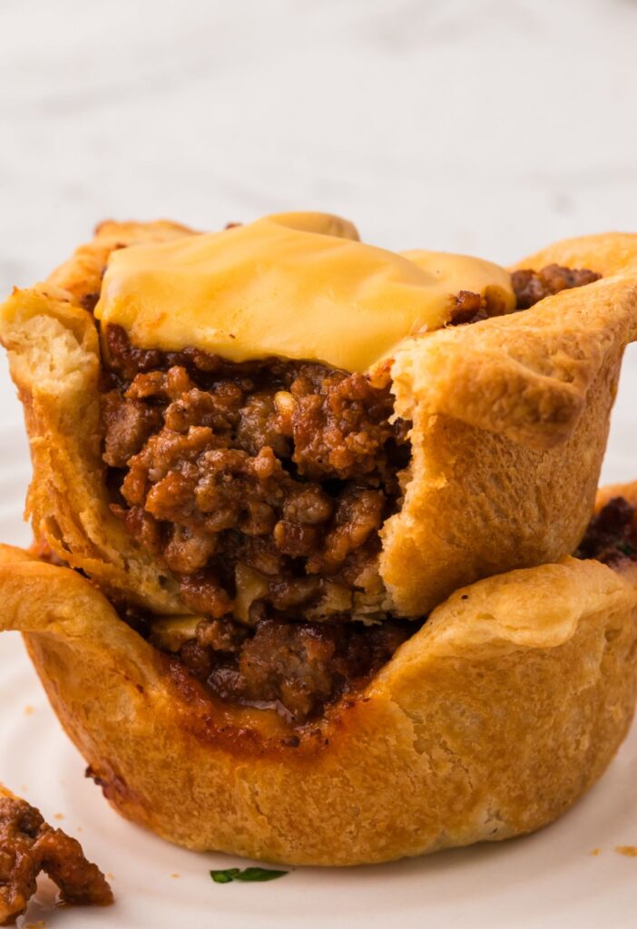 Inside of a sloppy Joe cup showing the ground beef filling.
