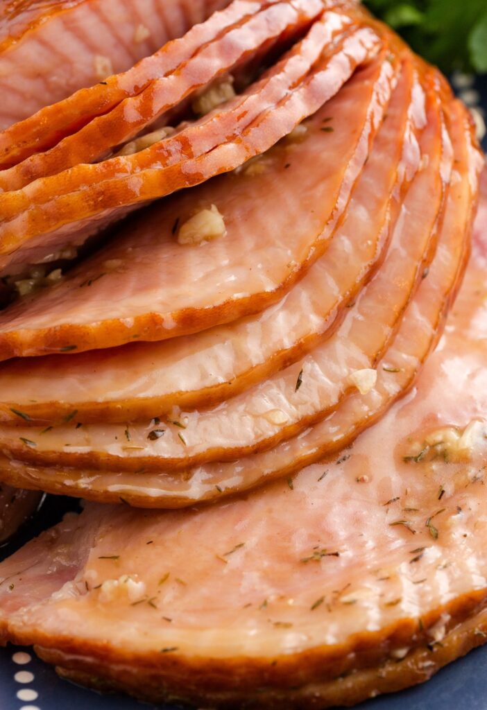Slices of the ham with a soda glaze on it.