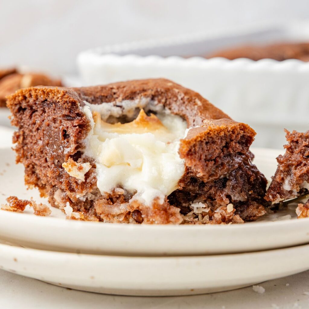 A piece of earthquake cake showing the cream cheese frosting pockets. 