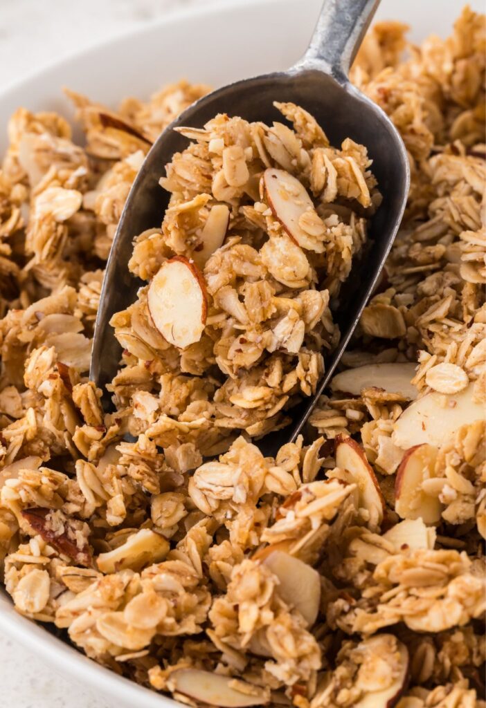 A scoop with granola in it