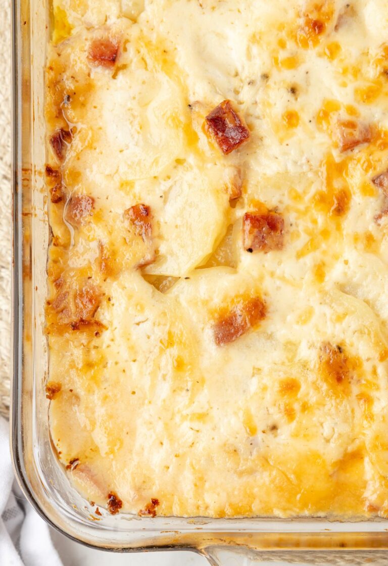 Scalloped potatoes baked with a cheesy topping and ham