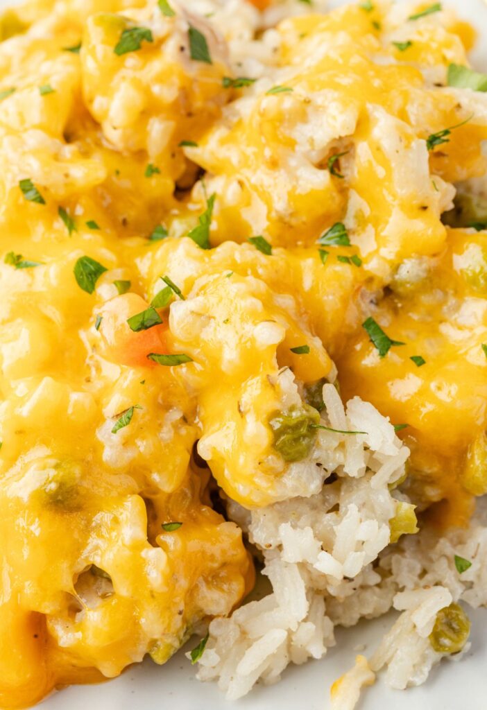 A serving of the chicken and rice with cheese, up close photo of it. 