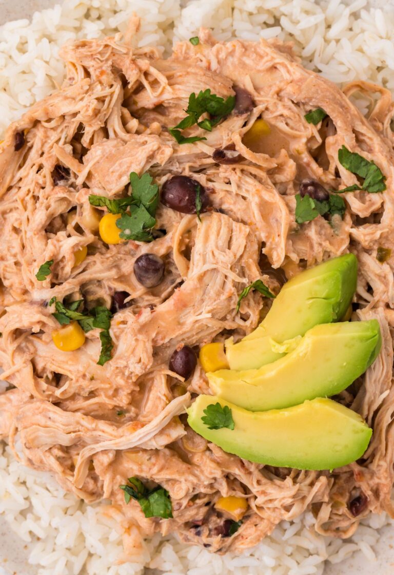 A serving of fiesta chicken with avocado slices on top