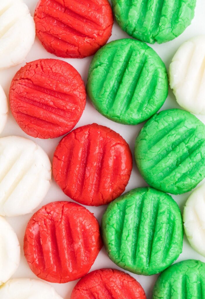 Rows of the red and green and white cream cheese mints for Christmas. 