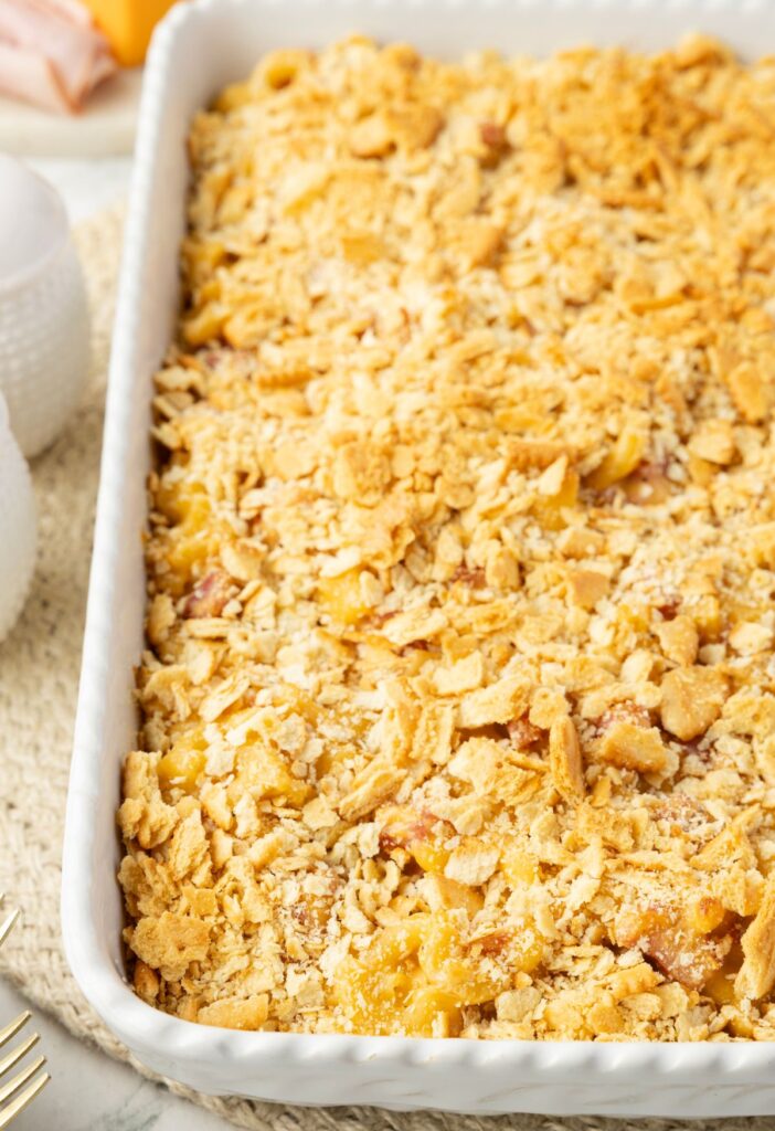Casserole dish with cracker topping on the casserole. 