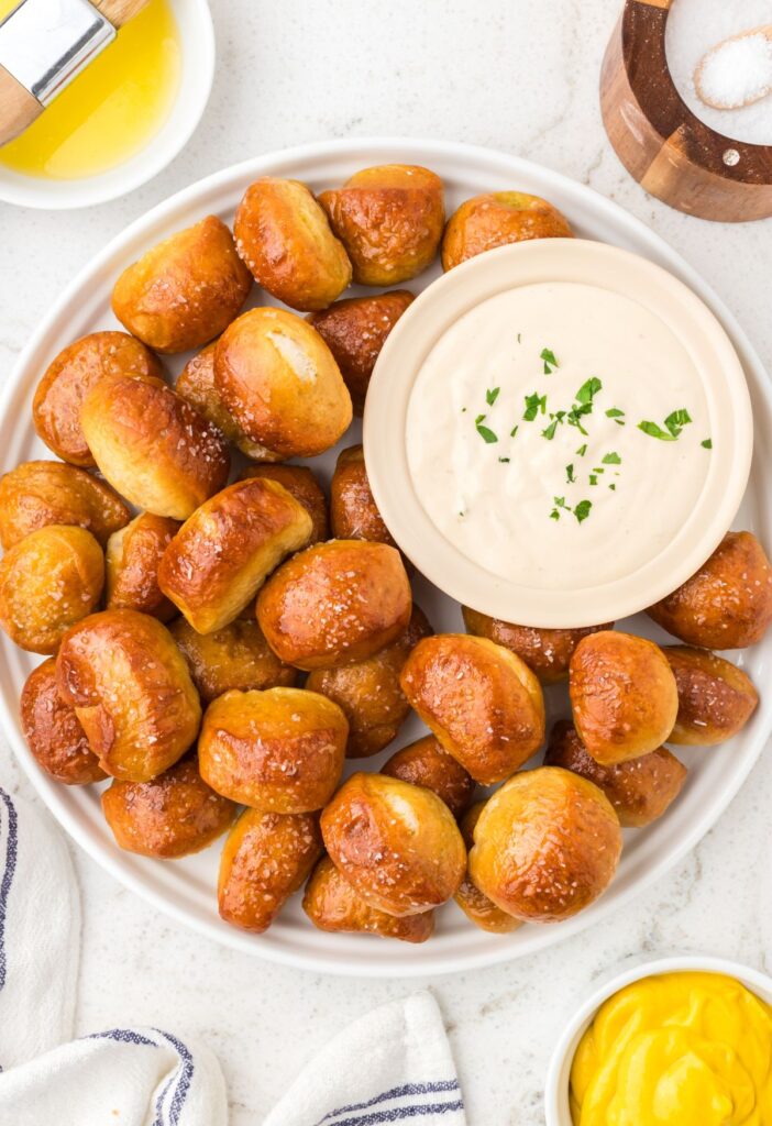 Serving plate of pretzel bites with dip