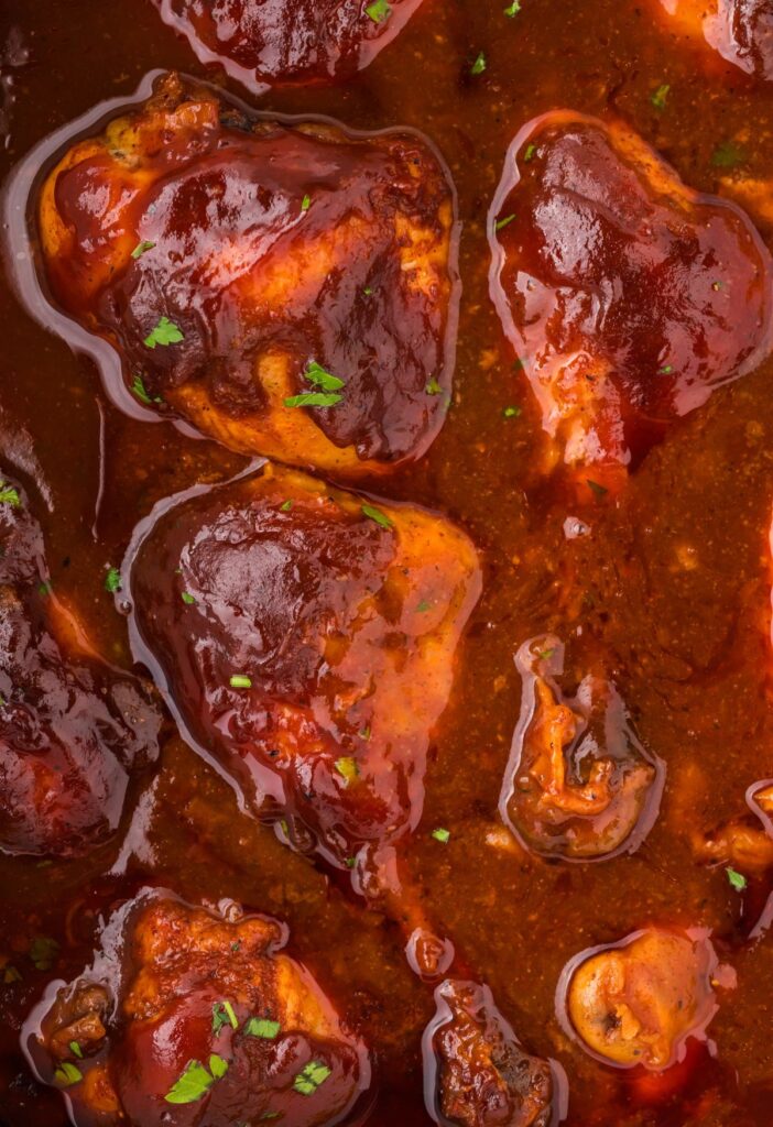 Close up of the chicken legs in the sauce