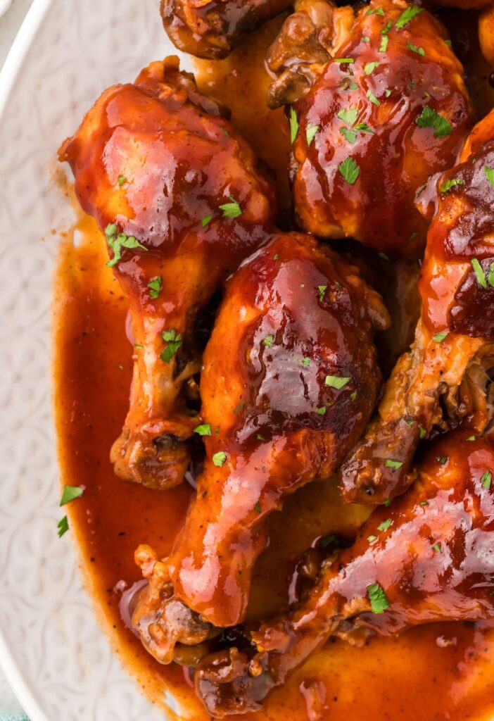 Serving platter of barbecue chicken legs