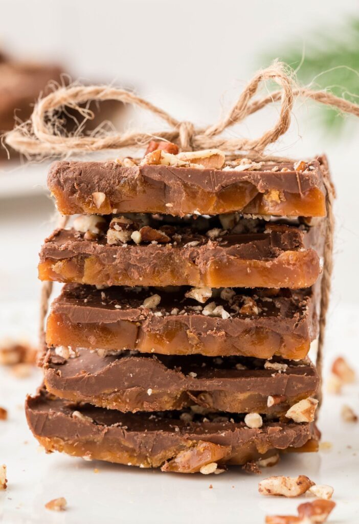 Stack of toffee tied with a brown bow