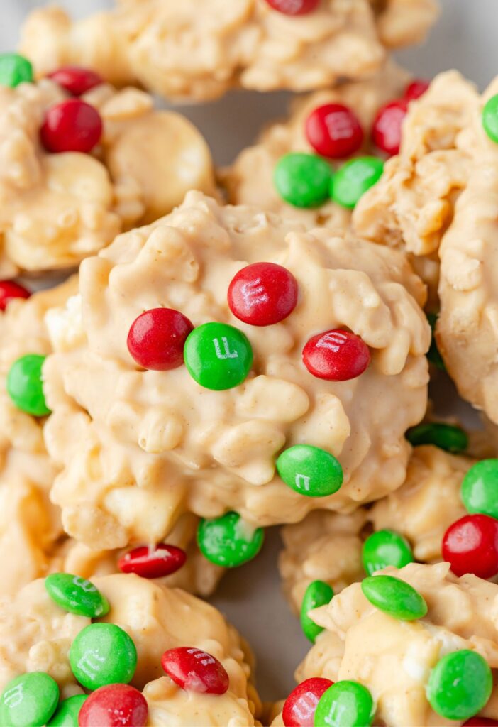 Avalanche cookies decorated with red and green candy for christmas.