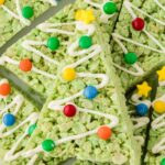 A tree made from Rice Krispies and marshmallows, decorated with mini m&m's.