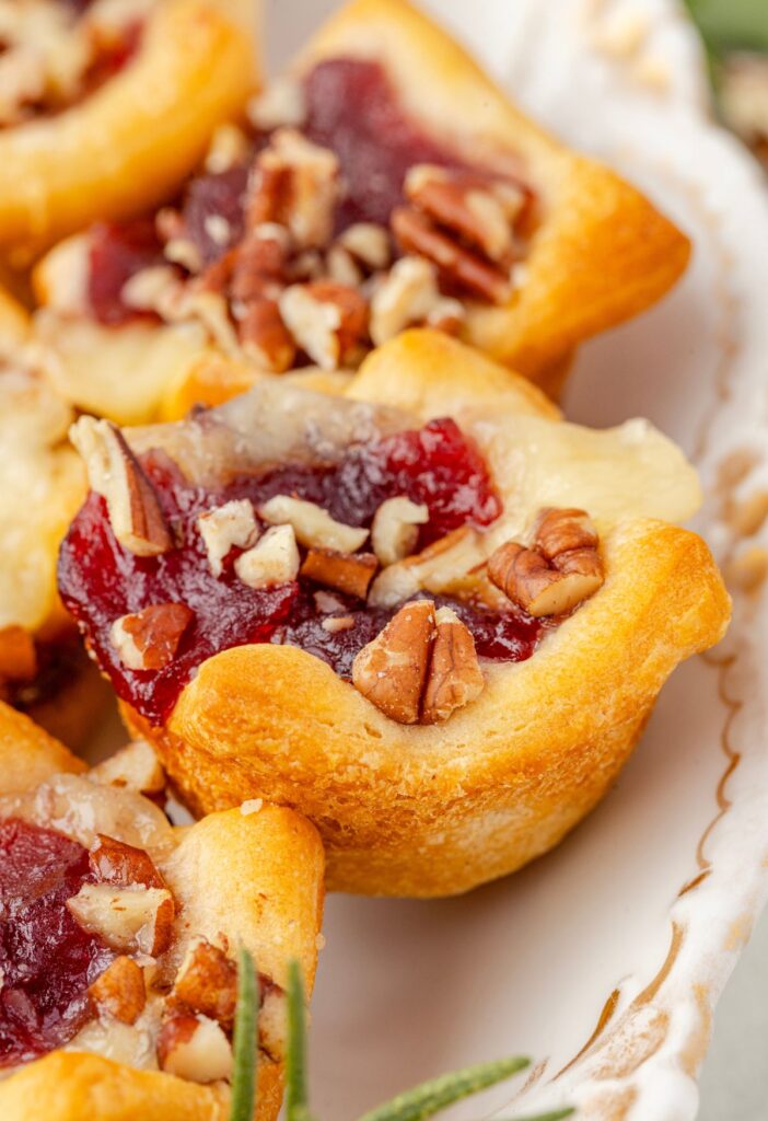Image of the cranberry brie bite on a serving platter ready to eat.