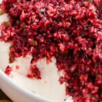 Hero image of the cream cheese dip with cranberries and jalapeno.