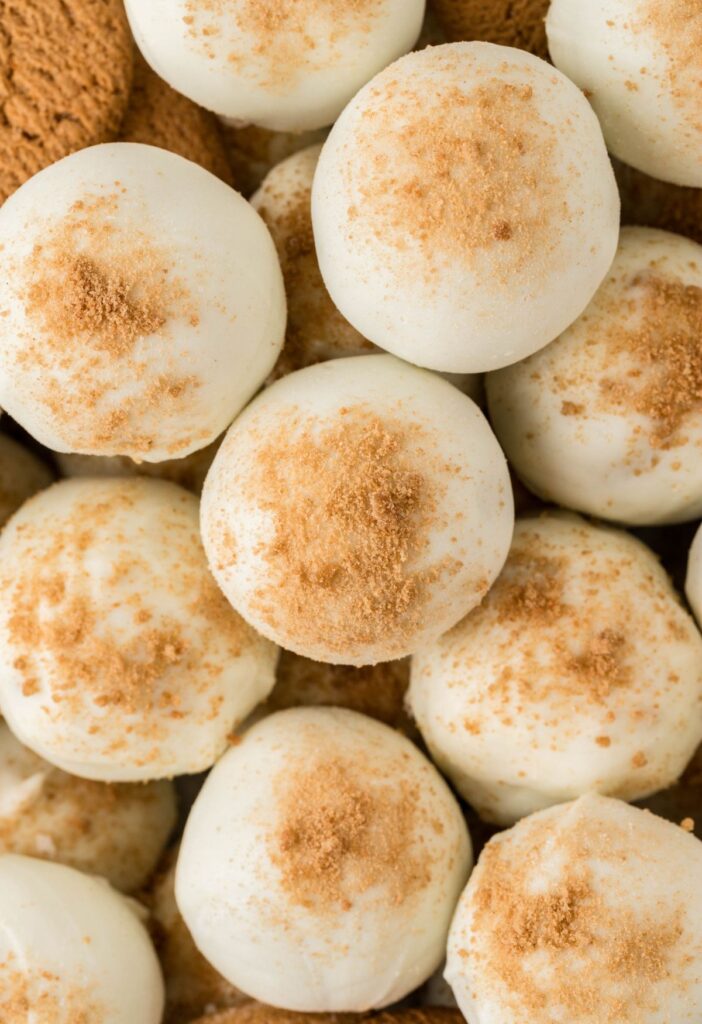 Close up view of the gingerbread truffles dipped into white chocolate.