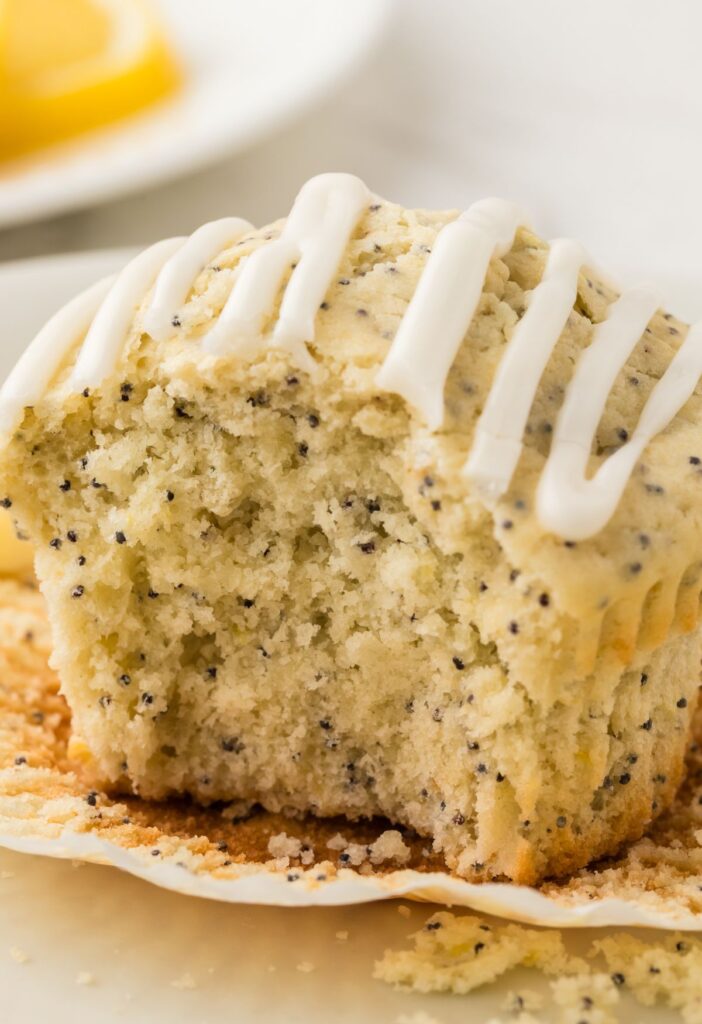 One muffin with a bite taken out of it