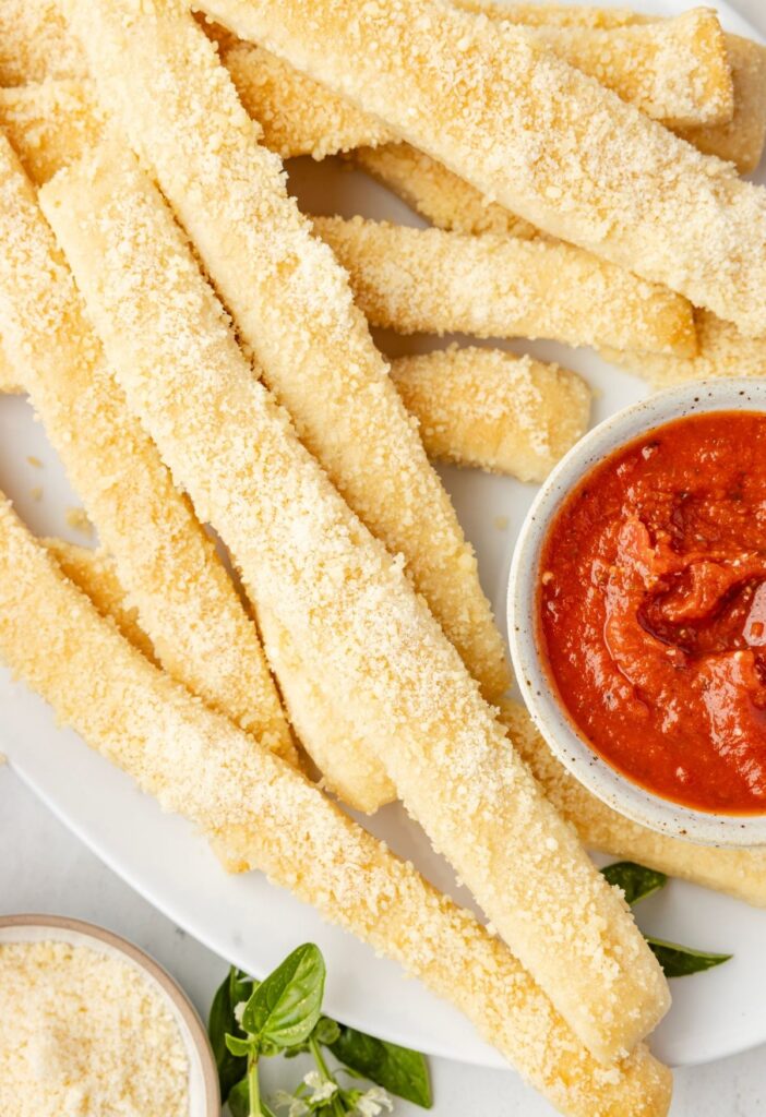Baked crazy bread with parmesan cheese