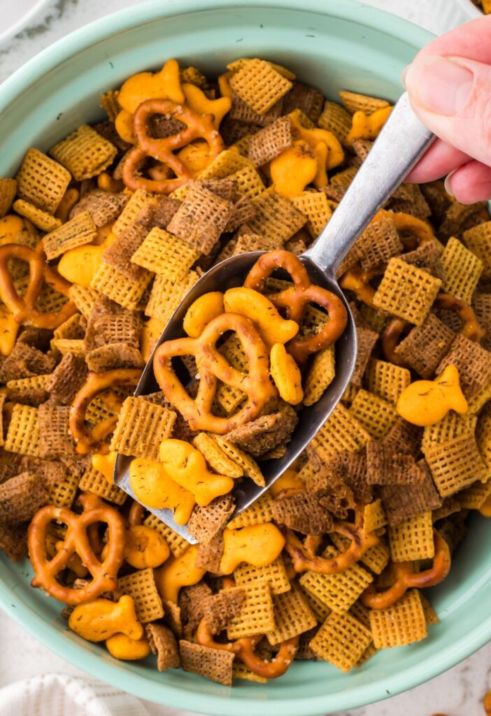 Top view of the bowl of savory chex mix with dill pickle juice.