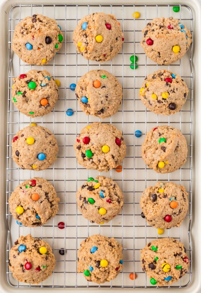 Cooling rack of baked monster cookies with no flour in them. 