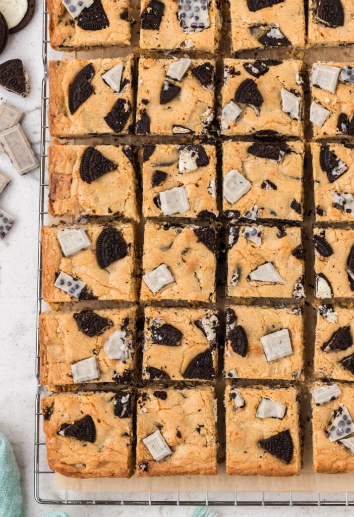 Top view of blondie bar squares on a cooling rack.