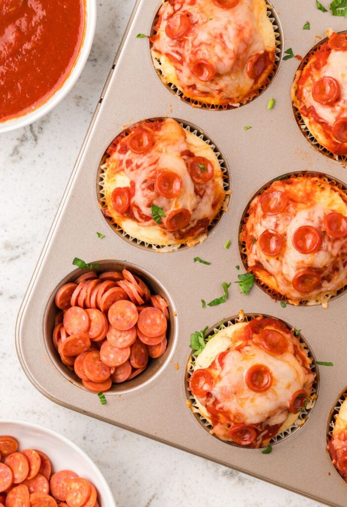 Pizza muffins in a muffin tin pan