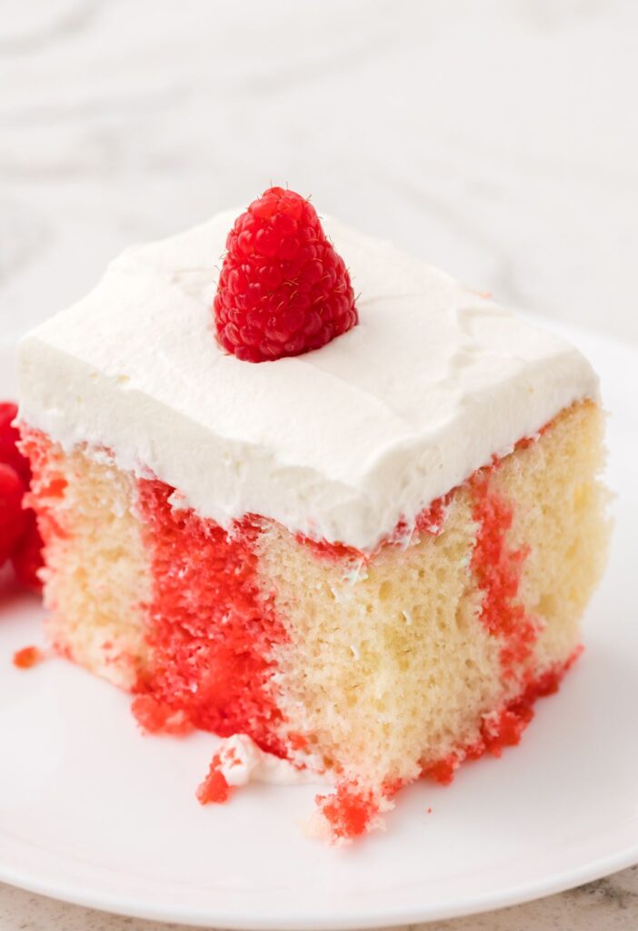 hero image for the poke cake with raspberry jello