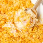 Casserole dish with a serving spoon in it