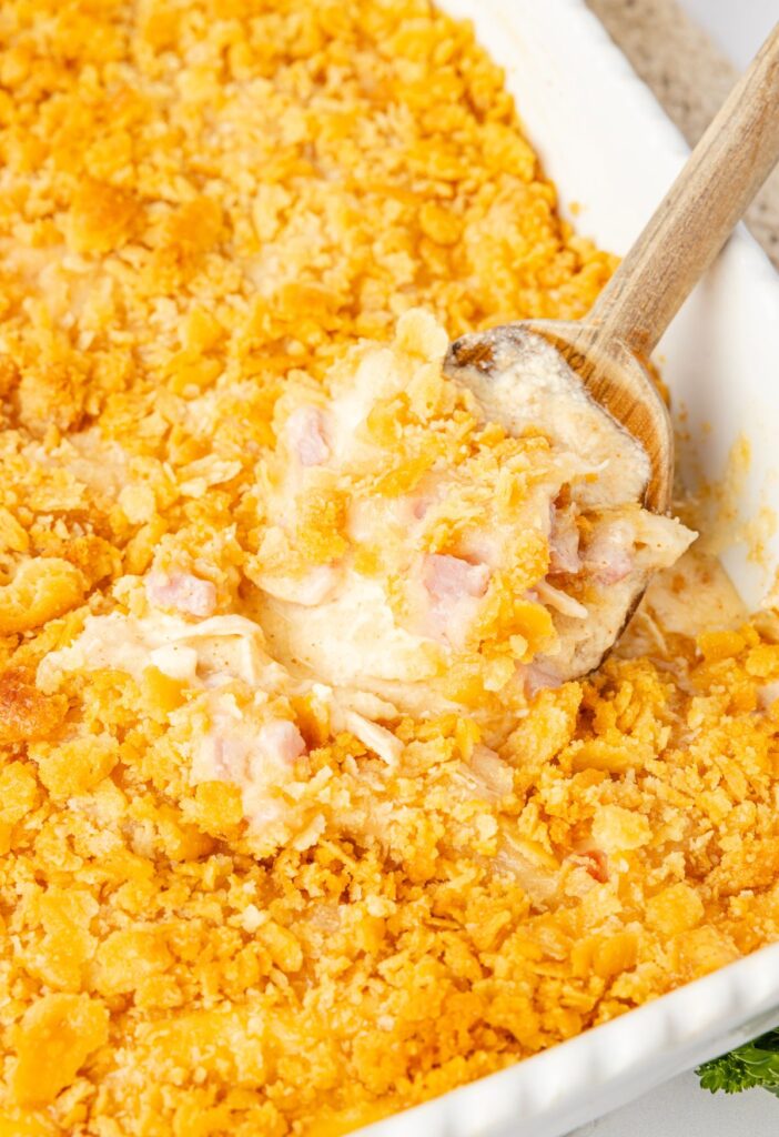 Casserole dish with a serving spoon in it