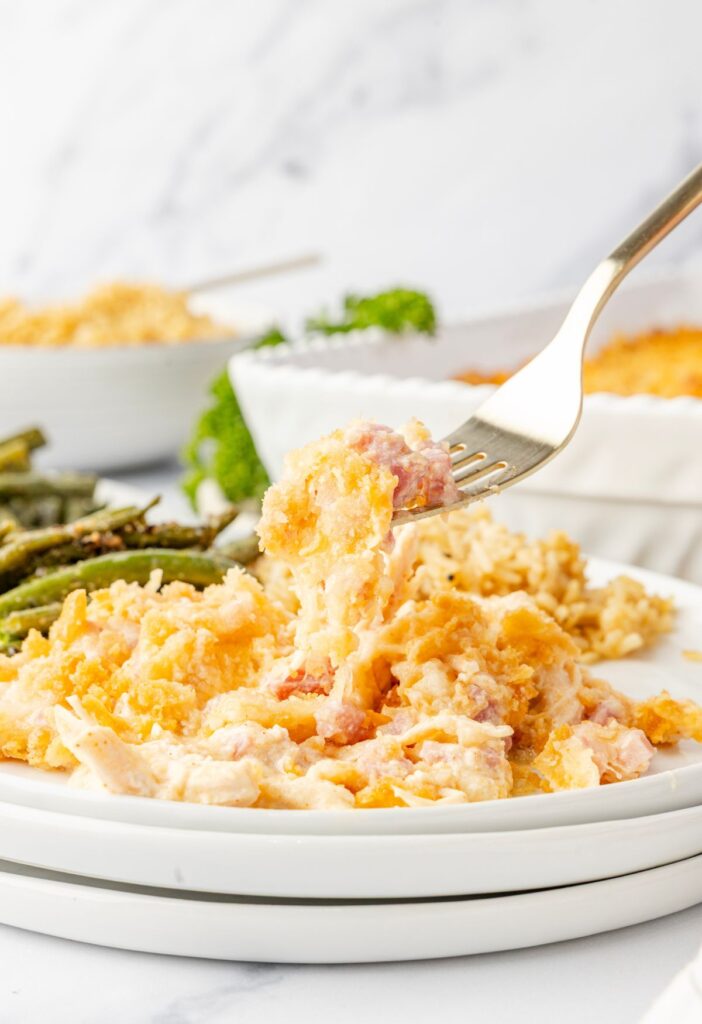 hero image of the casserole being served with a fork.