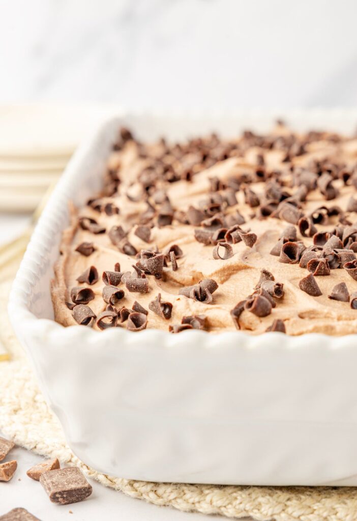 Side view of the cake pan with the chocolate cake inside of it.