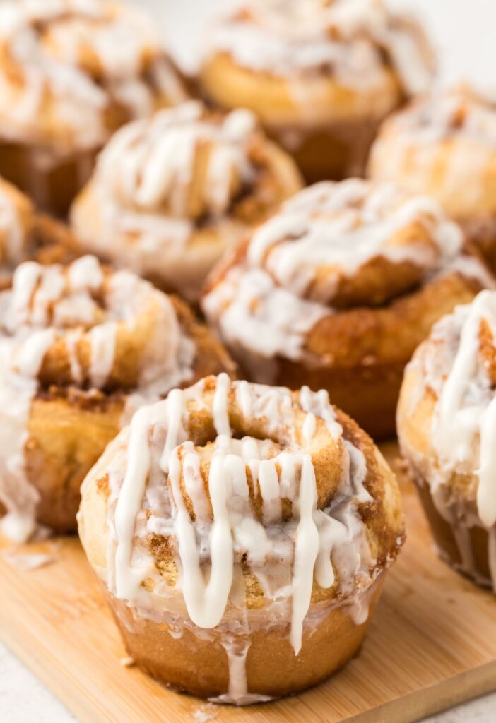 Cinnamon roll muffins on a parchment paper