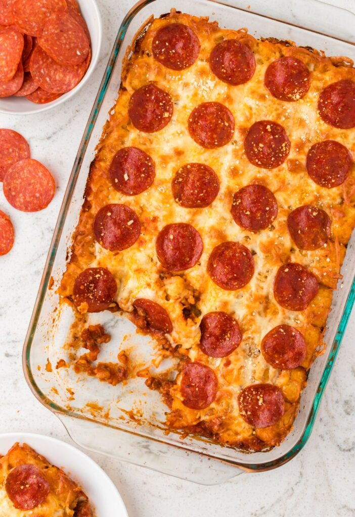 Over head pic of the baked tater tot casserole with pepperoni slices on top.
