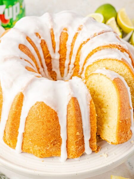 A bundt cake made with 7up on a cake stand